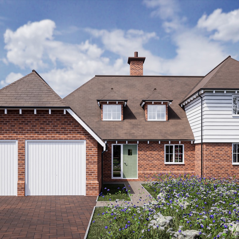 London brick house with garage and driveway