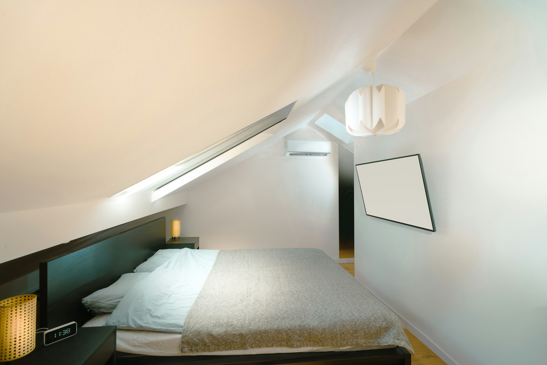 London loft conversion bedroom with skylights