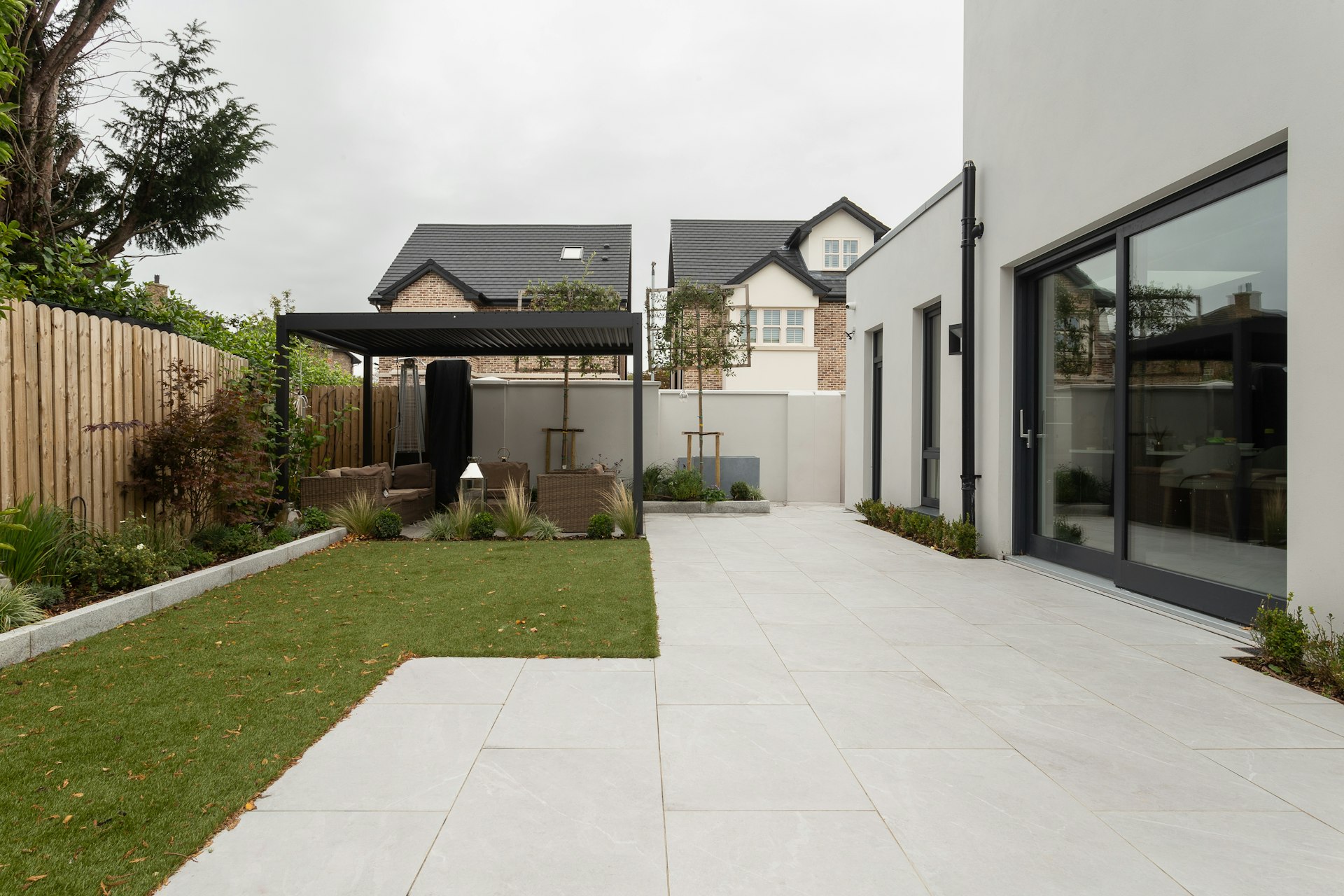 Completed side-return and rear extension opening onto a garden on an Ealing Edwardian terrace